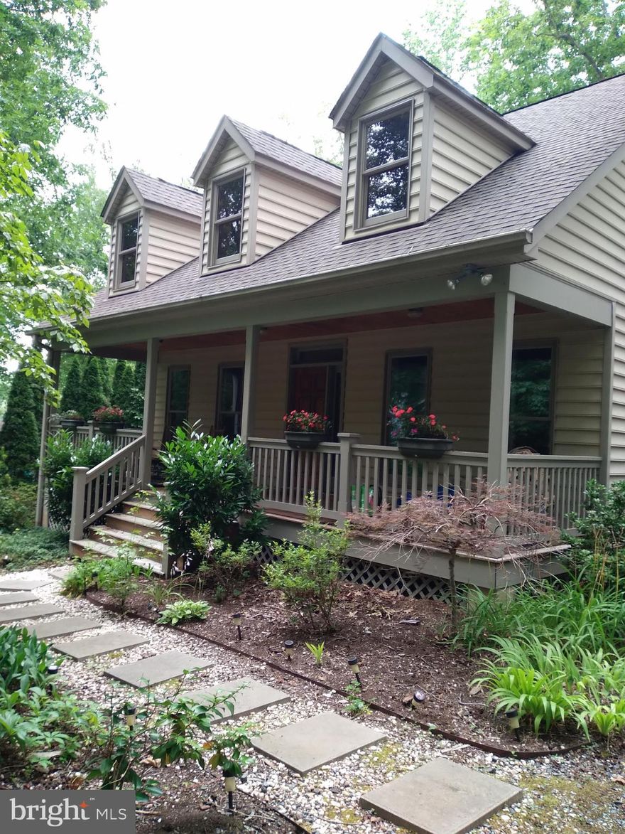 PERFECT RETIREMENT HOME ON LAKE ANNA!  One level living with 3 bedrooms and 2 full baths on a general sloping waterfront lot on the private side of Lake Anna.  Large screened in porch on the back overlooking the lake.  Single slip dock on a quiet cove over looking wooded land.  This is the ideal setting for your retirement home or weekend retreat.  Great investment opportunity as well.  You will have a hard time finding a waterfront home in this price range!