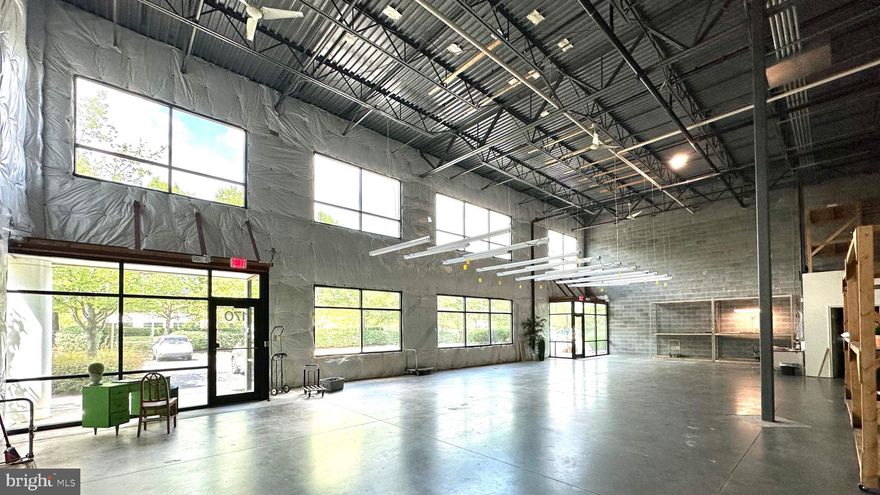 Excellent corner unit!  3,814 sq. ft. at the Trade Center Place, STERLING, VA. Great business location with access right off DULLES TOLL RD, two front entrances (possibly two 14 x 11 offices), exposed ceilings for your design, ROLL-UP BACK (12'  high x 10' wide) door. Drive-In on the back of the building with ample space for multiple county permitted uses including bakery; distribution, wholesale or  dry cleaning or veterinarian services. 10 minutes drive to Dulles International airport.

Great for one business/tenant, or individual suites for multiple businesses/tenants, including a separate owner’s suite occupied by owner’s business and the remainder rented out for additional income.

Lease rate $14/psf + CAM.