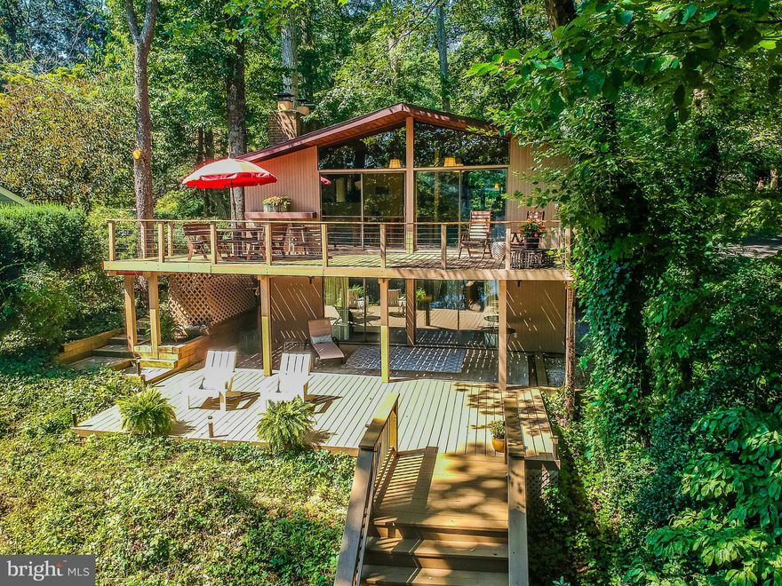 Pristine  waterfront home located on protected creek with a short boatride to The Severn River.  Well maintained deck house with improvements and renovations in the past 5 years.....new steps to the private pier; new lift pilings; outdoor dock shower.  Remodeled kitchen with breakfast bar.  Roof replaced with 30 year warranty and new gutter system.  Garage siding replaced  Open floor plan.  Multiple outdoor spaces for entertaining or just gazing at  the lovely Plum Creek waterviews with abundance of bird watching opportunities.