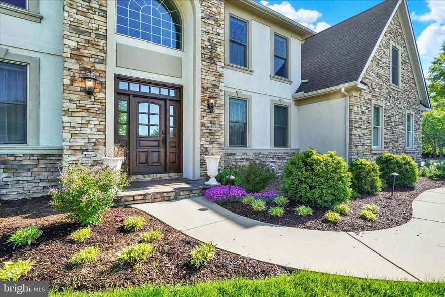 1302 Wicklow Drive is a stunning estate home nestled in the picturesque setting of Manchester Township, York County. Offering 5 bedrooms and 3.5 baths, this exceptional residence showcases true pride of ownership and timeless elegance throughout.
From the moment you step through the front door, you’re greeted by a breathtaking grand staircase that immediately sets the tone for the sophistication found throughout the home. Thoughtful architectural details abound, including coffered ceilings, handcrafted arched doorways, and refined finishes that create an atmosphere of luxury and comfort.
At the heart of the home is a spacious updated kitchen designed for both everyday living and entertaining. Meticulously maintained and tastefully updated, every inch of this home reflects quality craftsmanship and attention to detail. Including the luxury of a paneled SubZero refrigerator.
Indoor and outdoor living blend seamlessly with a covered patio overlooking the expansive, level backyard — the perfect setting for relaxing evenings or hosting family and friends.
Conveniently located near shopping, dining, major routes, and public transportation, 1302 Wicklow Drive offers the perfect combination of elegance, comfort, and accessibility.
