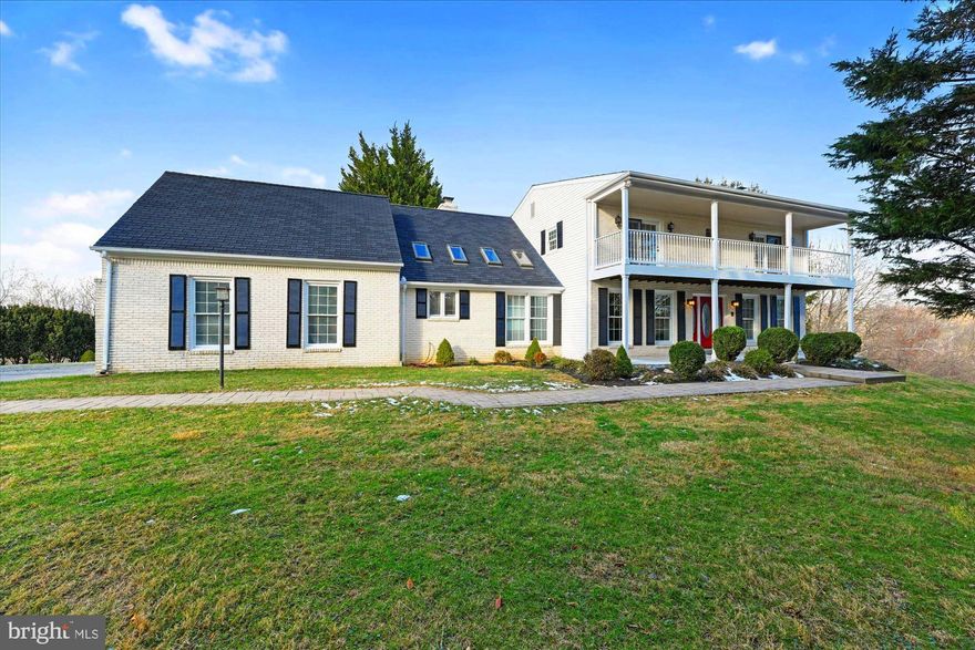 Price Reduced!  ASK ABOUT 2% INTEREST RATE DISCOUNT BUYDOWN FROM OWNER.  ( Agent is owner)
Immaculately remodeled and updated with an eye for detail.  
Fully renovated over the past two years with an eye for detail.  Gourmet table-space kitchen is massive and provides ample, bright space to cook and/or socialize, and has white shaker cabinets with soft close doors, high-end stainless appliances, granite counters, center island, cathedral ceilings, recessed lights, and fully functional sky lights (remote controlled open/close of window & blinds).  Formal dining room has glass 15 lite french double doors, crown molding, chair rail and wainscoting. Great room/family room is fantastic for large gatherings and has a full wet bar; a natural stone fireplace with heatilator (fills an entire wall),  cathedral ceilings, regal columns, recessed lighting and skylights.  Extra wide patio doors walk out to a wraparound deck with ample space for seating and stairs down to pool or back yard.    An additional separate living room with white brick fireplace and wood stove offers space for a more formal or intimate setting. 

The laundry/mud room has a large utility sink and connects to the garage and rear door and has LVT waterproof flooring. So is excellent for family or guests using the pool and to access the half-bath or for changing and putting wet towels/clothes directly into washer/dryer.  The half-bath has floor to ceiling glass tile backsplash and modern vanity, mirror and light. Also on the main level and an additional bedroom (great for an office, with a walkout to the deck)  and full bathroom.  

The upstairs offers 3 master bedrooms with private bathrooms and walk-in closets, 2 walk outs to upper deck.  The primary master bedroom suite has 3 closets .
Spa like master bathroom boasts a massive extra deep free-standing soaking tub almost 6 feet long with glass mosaic wall,  custom concrete counter-top double sink,  and custom porcelain stone shower. (reinforced walls ready for glass doors)  
The bedroom over the garage has a full bathroom, closet, all-in-one washer/dryer, and individual climate control.  Has been rented on Airbnb as a private efficiency suite with a small fridge and microwave.  Also above garage is a large finished room with plush carpeting,  window and separate mini-split heat pump; perfect for a private office, or additional living space to allow  efficiency room to be used or rented as a full apartment. 

The basement is fully finished with a 6th bedroom and bathroom, as well as a kitchenette with full-sized refrigerator and two living areas. Currently it is divided in half as a short-term rental, and the owners living/storage area separate.  The kitchen counters are black marble and the floors a beautiful, durable gray luxury vinyl plank.  The bathroom has ceramic floors and a double basin sinks with a custom concrete counter. 
Between the suite over the garage and the basement apartment, the current AirBNB income is between $2500-$3000/month but NO SHARED SPACE,  except the pool and parking area.  Either of these spaces  would also be wonderful if you have family that you want to keep close, but maintain your individual privacy.
The lower lot is large enough to corral horses or other livestock.  Currently there are several blackberry and rasberry bushes along the side of the property, (with paths to access them) and a grove of pear trees.  If you go all the way to the end, there is a small clearing  under a towering white oak, with a creek.  

Finally, the best part is you have your own private retreat just steps out your back door... your large private, roman arch pool with ample seating area, full steps, seat niche, diving board and in-ground spa.   
This is truly a one-of-a-kind home!  
Come find your future home!