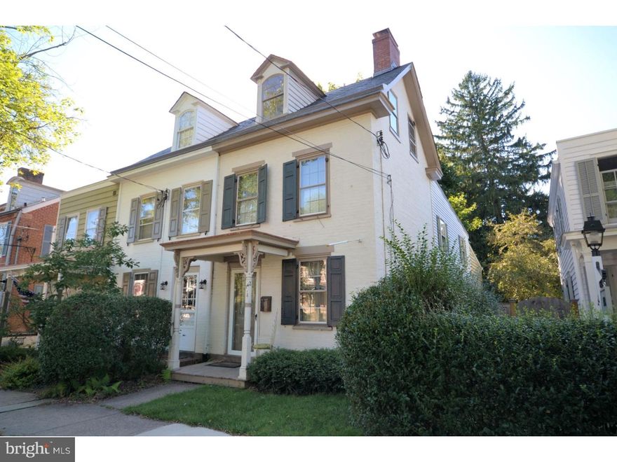 Historic Newtown Borough welcomes you to this rare gem, original wide plank flooring, formal living room with fireplace with custom surround,  state of the art kitchen with cherry custom cabinetry, granite countertops, built in oven, sub-zero refrigerator breakfast bar,  dining room area with hardwood flooring and a turned staircase to second level, two story family room with a wall of windows and great views of this private backyard. back staircase leads to a loft/bedroom area, ceramic tile hall bath with soaking tub and separate stall shower, Main bedroom features an abundance of closet space, hardwood flooring, turned staircase to loft area with tons of natural light and hardwood flooring, gas heat with central, this home is located directly in the center of Newtown borough!!!