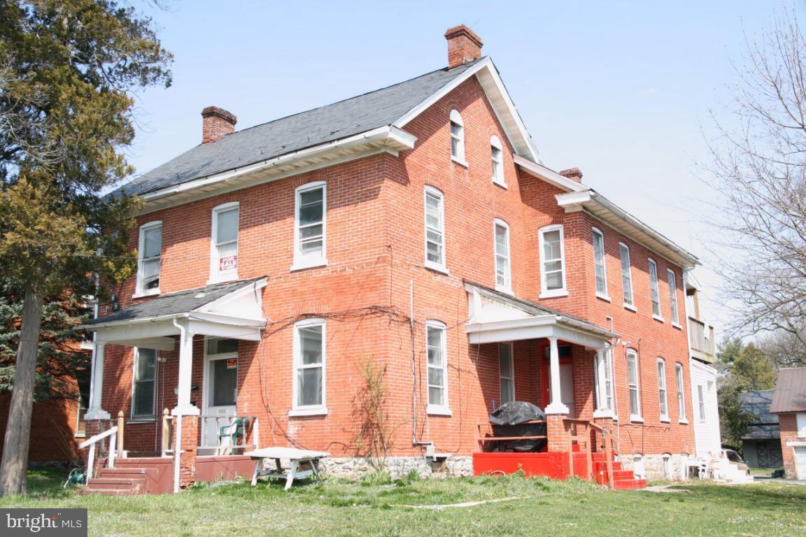Great Source of Income. Property has 8 Off-Street Parking Spaces, Gas Heat, and Electric Hot Water. Each apartment also includes its own electric heater. Live in one apartment and rent the others!