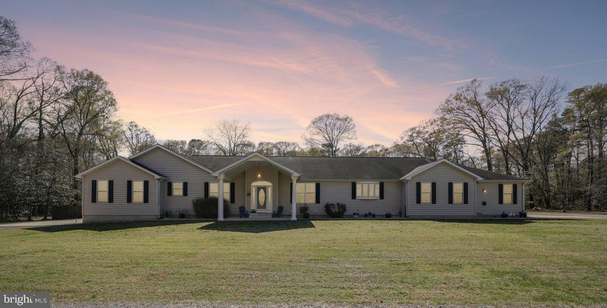 Welcome home to 54 Dayton Drive, ideally situated in the heart of Pasadena, MD. Set on an expansive 3.81-acre lot, this impressive 8-bedroom, 4 full and 2 half-bath residence offers space, flexibility, and exceptional lifestyle opportunities—get ready to be truly wowed. The main level of this two-story rancher features four spacious bedrooms and four bathrooms. One of the bedrooms is currently utilized as a private business or hobby space and includes its own separate entrance—perfect for a home office or studio. Designed with both comfort and entertaining in mind, the home showcases an open-concept layout complemented by multiple living areas that can easily serve as a formal living room, theater or media room, game room, or additional entertaining space. Generously sized bedrooms and abundant closet space reflect the thoughtful design and craftsmanship that went into every detail of this home. The kitchen and bathrooms on the main level are beautifully appointed, showcasing quality finishes throughout. The primary suite is a true retreat, complete with a spacious layout and a luxurious Jacuzzi-style tub—perfect for unwinding at the end of the day. The fully finished lower level offers incredible versatility, featuring four additional bedrooms and two full bathrooms. This level is thoughtfully divided into two separate, private units—ideal for multigenerational living or income-producing potential. Currently, each unit generates approximately $1,800 per month, with one long-term tenant already in place under a lease through October 1st, which will transfer to the new owner. As you approach the property, you’ll appreciate the multiple driveways providing convenient access to various points of the home and grounds. The main residence includes a two-car garage with ample storage, along with additional storage sheds and a pool house shed that convey with the property. With nearly four acres of land, there is plenty of room for recreational vehicles, hobbies, or even a home-based business—all with the benefit of privacy and space. Outdoor living is just as impressive. Enjoy your own backyard oasis featuring an in-ground pool with a liner replaced just three years ago, as well as a hot tub—perfectly positioned for year-round enjoyment and entertaining. With endless possibilities, including the potential to build an additional dwelling (subject to buyer’s due diligence and approvals), this one-of-a-kind property offers a rare combination of luxury, income potential, and flexibility. Schedule your private tour today and experience all that this remarkable home has to offer.