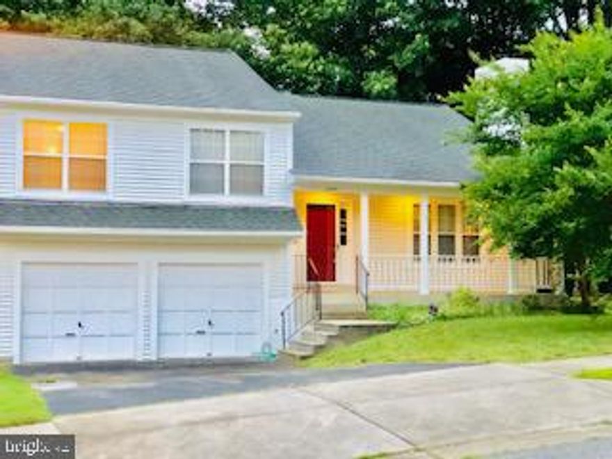 This home is cute as a button with much space galore for a growing family.  The home features an open concept family room with cathedral ceiling that extends to the dining room and main level.  The kitchen is  upgraded withe ceramic tile, stainless fridge, dishwasher and a back door for your deck and private yard area...ideal for cook outs.  There are 4 large bedrooms, including one in the basement.  The master bathroom is  spacious withe a private slider that leads to a smaller deck, a master bath and two closets.  The basement includes a very large family room with a slider leading to a covered patio, and the basement has a very large bedroom and a full bath  in the hallway.  There is a lower level area for much needed storage space that is accessible from the basement.  Call today for a tour.