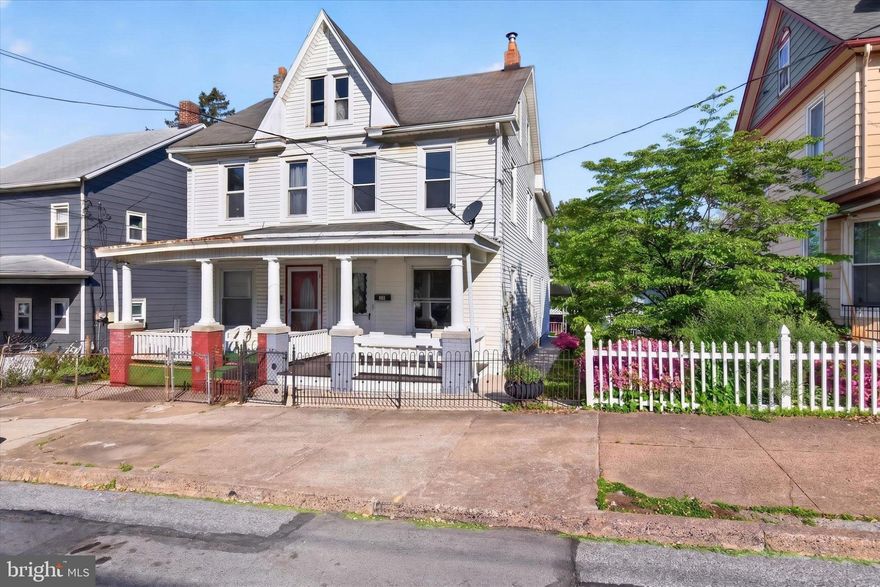 Welcome to 417 Lincoln Street in Steelton! This charming semi-detached home offers a bright, refreshed interior with spacious living and dining areas, neutral paint, updated flooring, and classic trim details throughout. The kitchen features white cabinetry, gas cooking, built-in microwave, dishwasher, refrigerator, and a bonus/flex area off the kitchen for added functionality. Upstairs you’ll find three bedrooms, a full bath, and convenient stacked laundry. The unfinished attic and full basement provide plenty of storage space. Enjoy outdoor living with a covered front porch, rear covered patio, yard, private parking in rear, and an in-town location close to local amenities, commuter routes, and downtown Harrisburg.