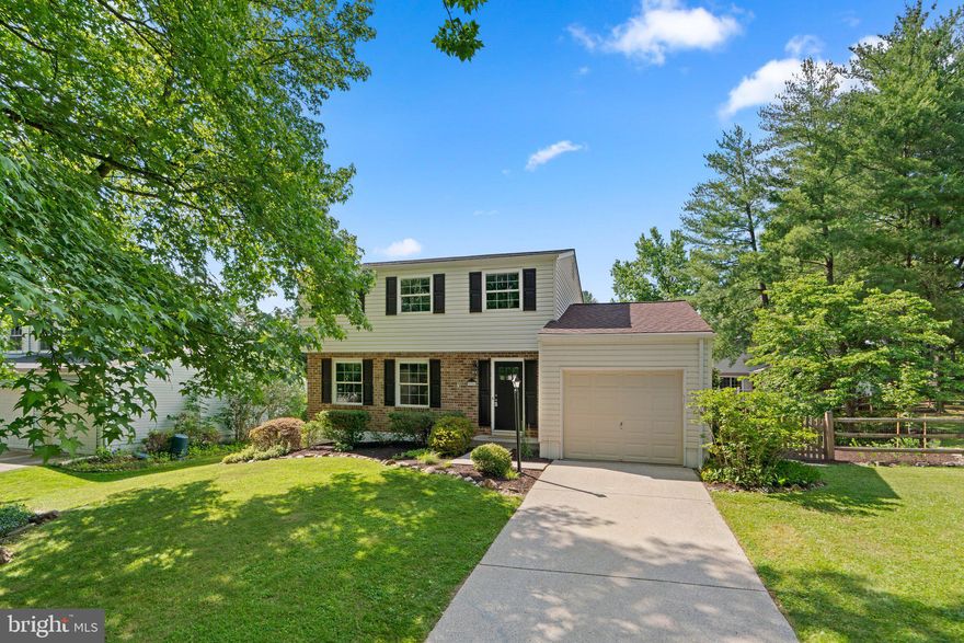 Must see 3 finished level colonial on a prime corner lot in the heart of Columbia! The seller has lovingly maintained and updated this home for the last 38 years. Endless improvements include: brand new roof w/architectural shingles (2024); new gas HVAC (2018); gorgeous wood plank floors throughout the main level; updated gourmet kitchen w/refinished cabinets, granite countertops, stainless steel appliances, gas oven/range, built-in microwave, top mount French door refrigerator, recessed lighting and pendant lighting; family room directly off the kitchen w/crown molding and slider to rear patio; separate living and dining rooms; remodeled first floor powder room; upper level w/3 spacious bedrooms, all with ceiling fans, and 2 remodeled bathrooms; primary bedroom w/double closet and en suite bathroom w/granite vanity, walk-in shower and custom tile work; fully finished lower level w/expansive rec room and large storage/utility room; oversized garage; fresh custom paint decor. Relax on the rear patio and enjoy the extensive landscaping and fenced in rear yard. An amazing location to multiple restaurants, shopping center, schools, walking distance to Lake Elkhorn and minutes to major commuter routes. This is a gem!