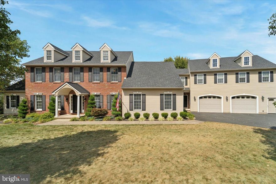 Welcome to the impressive Spring-ford Area School District home, perfectly designed for both grand entertaining and comfortable family living, complete with an in-law or guest suite.  This gorgeous home boasts a striking brick and siding facade, complemented by classic black shutters and a welcoming covered front entry.  The mature landscaping enhances its curb appeal, while an expansive driveway leads to a convenient two-car oversized garage, providing ample parking and storage.
Step inside to a bright and elegant two-story foyer where rich hardwood floors flow throughout the main living areas. A dedicated home office awaits behind beautiful French doors, offering abundant natural light and plenty of space for productivity. The formal dining room, complete with a new chandelier, fresh paint, chair rail molding and large windows is perfect for hosting dinner parties. The heart of the home is an open family room, featuring a cozy fireplace and ceiling fan,  seamlessly connecting to the kitchen for effortless entertaining. Thru the barn door you'll find a versatile bonus room with a vaulted ceiling and plush carpeting which offers endless possibilities as a play area, secondary living room,  gym, or second office, highlighted by a feature wall with cabinets and an arched window.
The main kitchen features elegant wooden cabinetry, granite countertops, a tile backsplash, and stainless steel appliances, including a french-door refrigerator and a central island with pendant lighting and seating. Adjacent to the kitchen, a charming breakfast nook with a decorative chandelier opens to a large deck through French doors, offering serene views of the pool & yard. Down the hall from the kitchen you'll find another spacious family room with large windows and natural light followed by the large mudroom area leading to the second entryway & garage.
The primary bedroom is a serene retreat with vaulted ceilings, a ceiling fan, and plush carpeting. The en-suite bathroom features a luxurious soaking tub, dual vanity with ample counter space. This bedroom also offers a bonus area. Add'l 3 upper level bedrooms share a newly renovated hall bath w/ contemporary dual vanity with dark wood, sleek black fixtures, and a glass-enclosed tile shower.  
The finished lower level provides even more living space, including a gathering room with vinyl plank flooring. This level also features a convenient kitchenette with blue cabinetry, a refrigerator, and shiplap accents, ideal for entertaining. French doors lead to the expansive outdoor living area. A flexible bonus room, currently used for storage/guest room, and a modern powder room complete this level.
Above the garage you'll find an in-law suite (with separate entrance) complete with a beautifully designed eat-in kitchen with crisp white cabinetry, dark countertops, and stainless steel appliances. This space has a large living area, bedroom, full bath, walk in closet, and its own laundry area (with a door that connects to the primary bedroom retreat of the main house. )
Next, step outside to your private oasis! The expansive backyard features a sparkling inground pool and hot tub, all surrounded by a large patio with plenty of space for loungers and dining. A covered patio area beneath the deck provides a shaded retreat. The deck, accessible from the kitchen, offers additional seating areas perfect for enjoying the views and outdoor entertaining.
Don't miss this opportunity! Close to Route 422, shopping and dining.