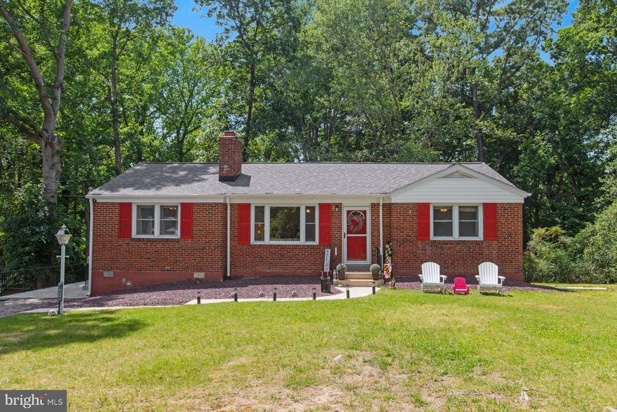 Welcome home to this charming all brick rambler in the sought after Green Meadows neighborhood!!!  This gorgeous home in Indian Head, MD boasts tons of recent upgrades that make this an instant show stopper.  Situated on a private .88-acre lot, this property offers tranquility and privacy. The spacious and lush yard provides plenty of space for outdoor activities, gardening, or enjoying peaceful moments in nature.  Inside you are welcomed with beautiful hardwood floors throughout and freshly painted walls, creating an inviting atmosphere.  During cold nights, grab a book and sit by the beautiful wood burning fireplace in your family room.  Inside the fully renovated kitchen you will find granite countertops, stainless steel appliances, tile backsplash, new light fixtures and new tile flooring, making this a chefs dream kitchen.  Additionally, this home includes a full unfinished basement, offering tremendous potential.  Whether you envision a recreational area, home gym, or additional storage space, this flexible area allows you to personalize it to suit your needs.  If you enjoy being in nature, take a walk through your backyard and find one of the trails that will lead you to Pomonkey Creek or the Potomac River and enjoy the true beauty of Southern Maryland.   This home also features 3 bedrooms, 2 full bathrooms, new roof in 2020, newer hvac, two separate living areas, a huge concrete patio that is a perfect space for hosting your friends and family, and is centrally located near schools, parks, shopping and Indian Head Naval Base.  Don't miss out on your chance to call 3210 Green Meadows Dr your new Home!!  For a private showing, call me today.
