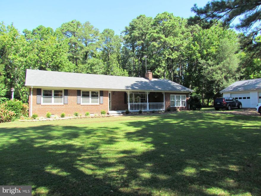 Charming Brick Rambler on 3.65 acres. This home features a eat-in kitchen with SS appliances, living room with fireplace, large family room and 3 bedroom with plenty of natural light. Enjoy relaxing on the covered front porch or the rear patio. Additional features include built in cabinets, a detached 2 car garage and a geothermal unit. Make sure this one is on your must see list!