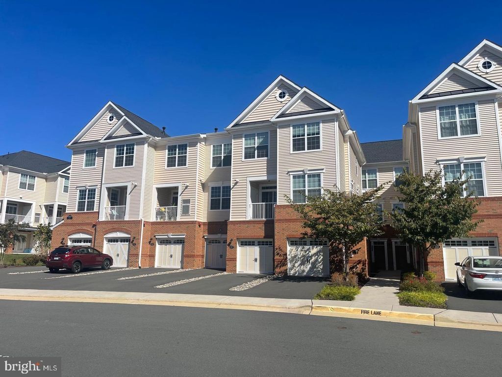 Photo of 43032 Stuarts Glen Terrace #106, ASHBURN, VA 20148 (MLS # VALO2116400)