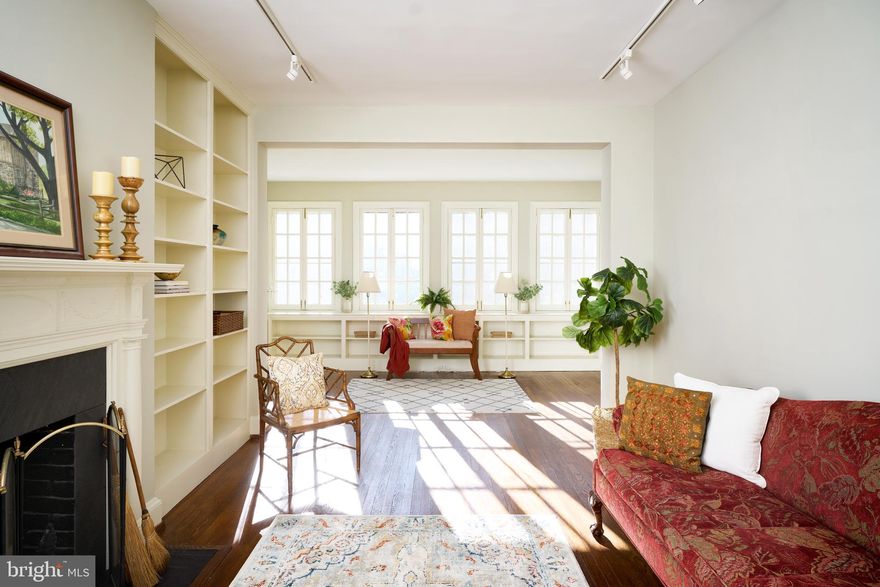 Spacious & striking 2nd floor apartment awaits you in the 1918 Tuscany, built in the Italian Renaissance style by architect Clyde Nelson Friz, who later designed the Enoch Pratt Library downtown. The apartment features a welcoming foyer, elegant & large living room with fireplace & built-ins; updated kitchen that opens to the dining room & a fabulous sunroom with a bank of large windows providing amazing light & gorgeous views of landscaped gardens. There are three bedrooms & two full bathrooms, including a primary suite with a renovated bathroom. High ceilings, hardwood floors & track lighting. In addition, there is an additional unit in the basement conveying with sale that offers private washer & dryer and storage. The Tuscany and the neighboring Lombardy form a cooperative apartment complex that features lovingly cared-for grounds and a broad, shady “dell,” perfect for picnics or just enjoying the flowers. The monthly co-op fee includes taxes, heat & water. The Lombardy, in the heart of Tuscany Canterbury, is within walking distance of Linkwood Park, Wyman Park, Sherwood Gardens, the Johns Hopkins University Homewood campus, the Rotunda, and Hampden shops and restaurants. Parking spaces are available on the street or a garage may be rented for a monthly fee. Please note that there is not an elevator in this building.