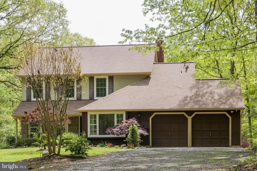 Privacy, quiet, wildlife (game), farm/animals fine NO HOA. 360 Views. Home away from home, 10 SPECTACULAR ACRES WITH PLANTATION PORCH. LOVELY UPDATED HOME with new roof, windows, granite kitchen, completely re-painted.  Fireplace, a 2nd wood stove and a FANTASTIC FINISHED LOWER LEVEL WITH IN-LAW SUITE, BATH, 2ND SEPARATE WALK-OUT.  Light, bright, landscaped. Rare acreage.  Approach on gravel road.