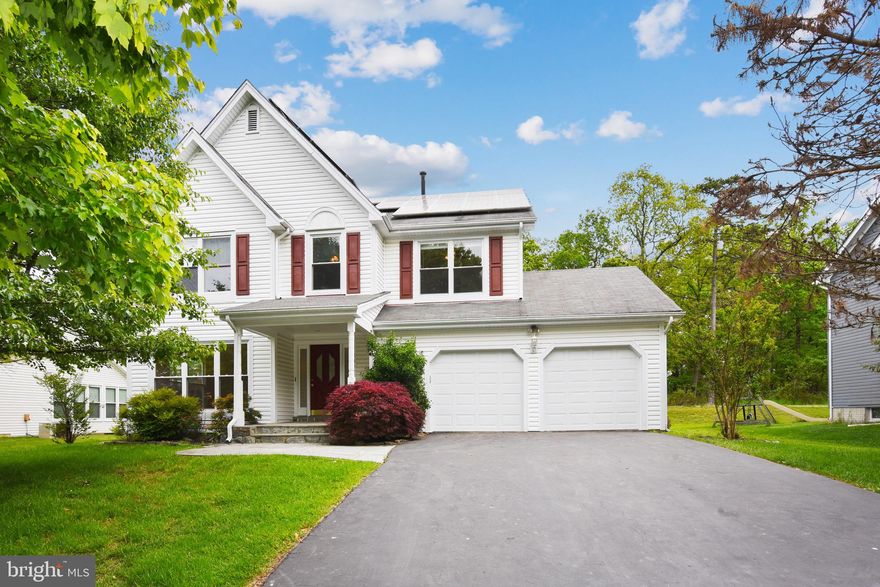 Beautiful 4 bedroom, 3.5 bath light filled home conveniently located in a peaceful and tranquil setting in the Stonebridge community. The main level features large windows and gleaming hardwood floors. The  large foyer leads you into formal living and dining rooms that open to a fantastic eat-in kitchen with stainless appliances and granite center island cooktop.  Step down from the kitchen to a magnificent 2-story family room with high ceilings, large windows, cozy wood burning fireplace and skylights that bring in soft natural light. Views of the private backyard and a huge deck, will make you start thinking about outdoor Summer BBQs. The Upper level boasts a Laundry Room and 4 large Bedrooms including the Owner Suite with a fabulous soaking tub and skylights for a spa-like retreat. Finished lower level  has a large recreation room with 2 private rooms and a full bath.  Highly energy efficient with solar panels that are owned and not leased. Things to love about this neighborhood: sidewalks, pool and tennis, ball fields, walking distance to shopping center with Trader Joes, 7/11 and restaurants. Virtual as well as in-person tours are available.