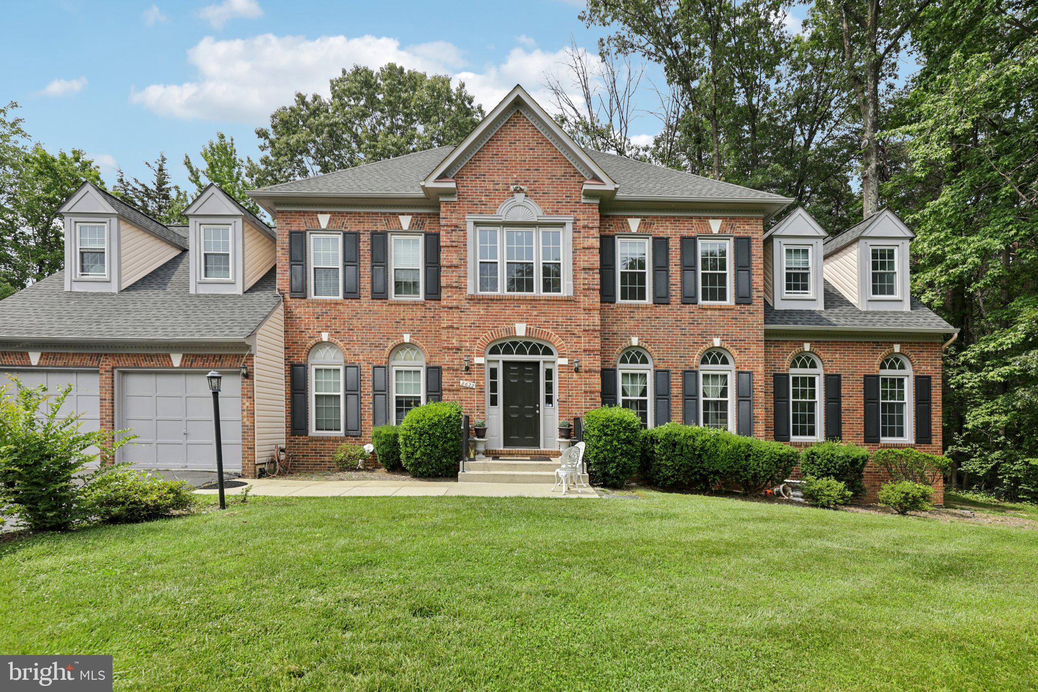 Step into your dream home in the prestigious Crosspointe community, where elegance meets practicality. This charming brick-front colonial, set on a spacious 0.51-acre lot, offering a serene retreat with convenient access to vibrant neighborhood amenities. Upon entering, you'll be greeted by a vaulted ceiling foyer that leads to a beautifully appointed kitchen with generous counter and cabinet space, and complemented by picturesque views of the serene backyard. Adjacent to the kitchen are the convenient laundry room and a two-car garage, streamlining your daily routines. The family room featuring a cozy fireplace, provide ideal spaces for entertaining and family gatherings. The living room and sunlit sunroom further enhances the inviting atmosphere. The main level also includes a dedicated study/office, equipped with built-in bookcases, creating an ideal environment for working from home or enjoying quiet moments. Upstairs, discover five spacious bedrooms, each providing ample comfort and natural light, and two full bathrooms on this level ensure convenience and privacy. The peaceful neighborhood setting is perfect for street games, bike riding, and friendly gatherings. Community amenities further enrich your lifestyle with outdoor swimming pools, playgrounds, tennis courts, and scenic trails. Don’t miss this exceptional opportunity to own a beautiful home in a community renowned for its outstanding amenities and welcoming spirit. Comes with builder warranty