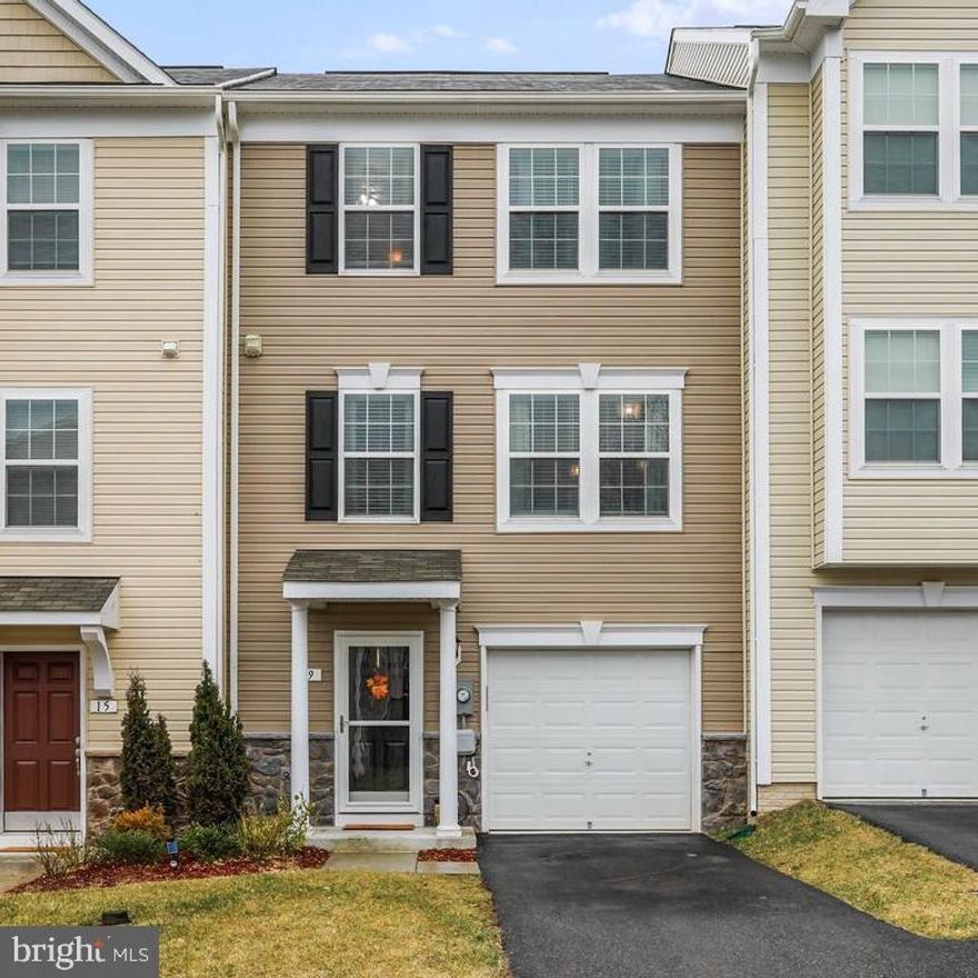 Coming Soon! Discover the charm of this beautiful three-story townhome in Stonebrook Village. With brand new carpet being installed, this home is ready to welcome its new owners. The main level features a versatile recreation space that can easily be transformed into a fourth bedroom, perfect for accommodating guests or your unique needs. The kitchen is a chef’s dream, showcasing elegant 42-inch maple cabinets paired with a stunning white quartz countertop and a generous island for culinary creations. The inviting morning room addition offers plenty of space for memorable gatherings with family and friends. Upstairs, the luxurious primary suite features a deluxe bathroom setup complete with a stylish tiled soaking tub and a separate tiled shower, alongside a spacious walk-in closet for all your storage needs. Two beautifully appointed secondary bedrooms share a well-appointed hall bath. This home is move-in ready, allowing you to simply add your personal touch and make it your own!