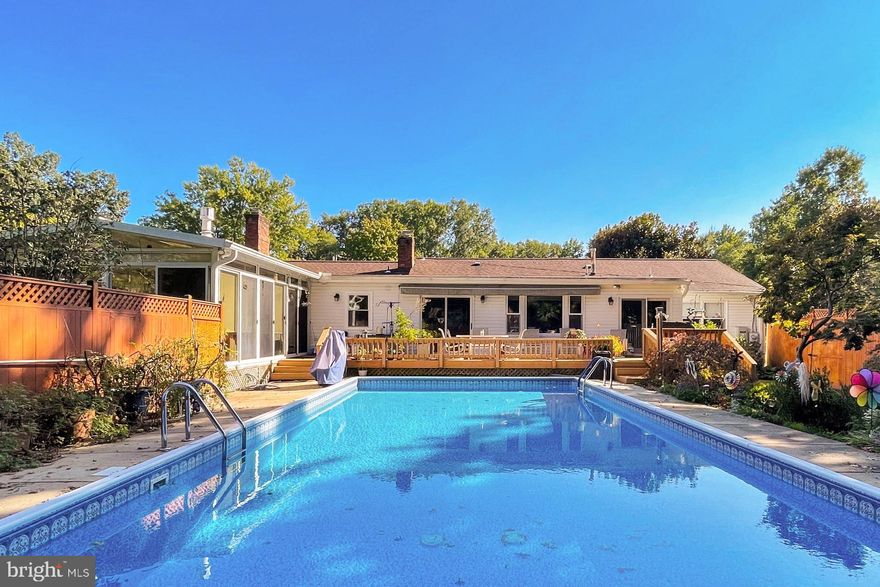 Welcome to this wonderful lovingly cared for home by the original owners!  Perfectly set on a gorgeous  .46 acre cul-de-sac location.     5 bedrooms and 4 bathrooms, 4 season sunroom, and a heated pool make this a rare find!    Celebrate with friends and family in this flexible floorplan ready for all of your gatherings.   The original floor plan was expanded to provide a large family room and easy access to the colorful and fully fenced backyard.   You can have all of your living on one level if needed with so many flex spaces to suit your style and floorplan needs. 
New carpet and freshly painted throughout.   Some existing hardwood floors under parts of dining and living rooms.    All the convenience of a laundry center with a utility sink on the main level.   Modified primary suite for convenient assisted showering with low entry threshold tub and private access to the pool and deck.   The perfect retreat to start and end your day.
The lower level creates so many opportunities for additional living and gathering space with a game room open den space, 2 bedrooms and full bath.  Cozy up by the fireplace for movie night or game day. 
The utility workshop area with walk-up access to the side yard.   Refrigerator and freezer convey.    A few additional features /updates include a home backup gas generator (2023), and a separate AC & Gas stove in the sunroom making it a welcoming place to unwind all year round. The shed has electricity.   The pool is heated and has been professionally maintained by Hawaiian Pool Co.  The pond has a small waterfall element and pump and was serviced by Harmony Ponds.   Handicap access battery-operated chair to the pool conveys (less than 3 years old).   Retractable awning over the deck conveys.  The pool table and pachinko machine convey "as is".  Please see the document section for additional details. 
Don't miss the spectacular aerial video and Iguide for 360 tour and measurements (Links).
Note: Selling Agent related to Owners.
  
All this can be found with the added value of cul-de-sac living in a welcoming community with easy access to Richmond Highway,  Mount Vernon Highway, GW Parkway, and other major routes. Plenty of shopping, dining, and entertainment choices are available in every direction including Old Towne and Kingstowne Town Center. Explore Huntley Meadows Park, enjoy fine golf courses, set sail at Belle Haven Marina, visit local historical sites, and take advantage of the Potomac River offering boating, fishing, and leisure activities. If you’re looking for enduring quality in a spectacular location, it awaits you here. Welcome home!