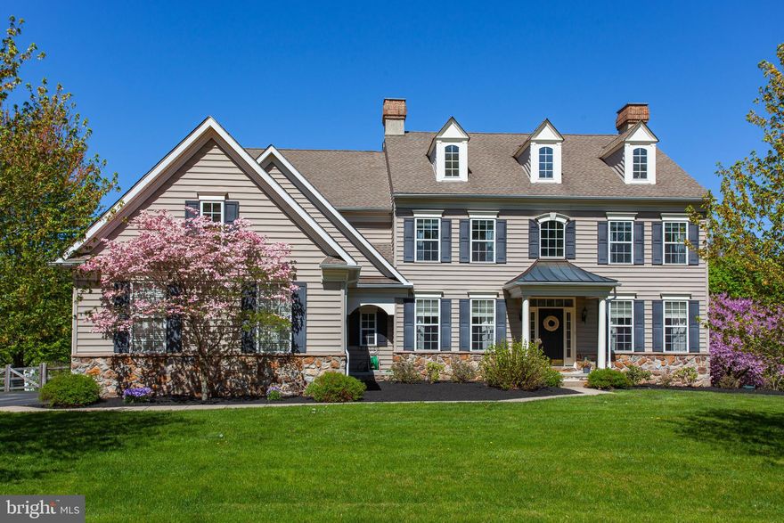 Welcome to this stunning 5 bedroom, 4.5 bathroom home located within a small cul-de-sac community in Glenmoore. From the stately curb appeal to the premier lot with private fenced rear yard, this 3/4 acre property surrounded by mature trees and serene countryside views will take your breath away. Step inside & you are greeted by a bright & spacious 2 level foyer with curved central staircase, soaring ceilings & crown molding throughout. The open concept layout seamlessly integrates the living room & dining room for memorable gatherings. The heart of the home is the large eat-in kitchen which is opens to the family room, both showcasing tall windows with transoms bringing in the sunlight and views from the rear of the property. The kitchen is equipped with 42" cabinets, stainless steel appliances, a spacious island, and a walk-in pantry.  French doors from the kitchen open to an elevated deck to enjoy outdoor entertaining or quiet nights & sunset views. Back inside, the large family room offers a choice of gas fireplace or cast iron pellet stove for extra warmth & coziness throughout the winter months. A powder room, 1st floor flex room that can be used as an office or in-home gym, & laundry room with access to the 3-car garage completes the main level. On the upper level, which is accessible from both front & rear stairs, you are greeted by a bright & spacious 2nd level foyer. Double doors lead to the primary suite featuring tray ceiling, large sitting room, 2 walk-in closets, & an en-suite bathroom with jacuzzi tub, shower & double vanity. Three more generously sized bedrooms, one with full private bathroom & 2 bedrooms that share Jack-n-Jill bathroom complete the 2nd floor. But the luxury doesn't stop there. With over 1,000sf, the finished walk-out basement adds valuable living space featuring a 5th bedroom, full bathroom, wet bar, recreational area & plenty of room to create the living space of your dreams. Nature enthusiasts will appreciate the close proximity to Marsh Creek State Park & walking trails. Award winning Downingtown Area School District including STEM which has recently been ranked 2nd BEST high school in PA. House is equipped with ADT security system as well as Invisible Fence around both front and rear yards.