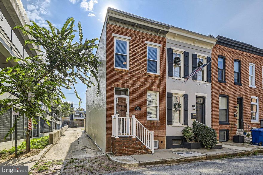 Great location in the heart of Federal Hill. End of row townhome on a quiet side street less than 2 blocks away from all the restaurants and bars and only a 10 to 15 minute walk to the Inner Harbor, Federal Hill Park and M&T Stadium. This 3 BR / 2 Full Bath townhome features hardwood floors on the main and upper levels along with newly installed luxury vinyl flooring in the basement, kitchen and bathrooms. You will find a traditional layout with the living room, dining room with exposed brick fireplace and the kitchen on the main floor with access to a fully fenced in patio in the back. Upstairs you will find two bedrooms and a full hallway bathroom. There is a spacious primary bedroom with plenty of closet space and a second full sized bedroom with a walk-in closet which also opens up to your own private deck. The finished lower level offers a 3rd bedroom/flex option, an additional full bathroom and a laundry room. This townhome is move-in ready with plenty of street parking available (permit required). No Smoking and small pets optional.