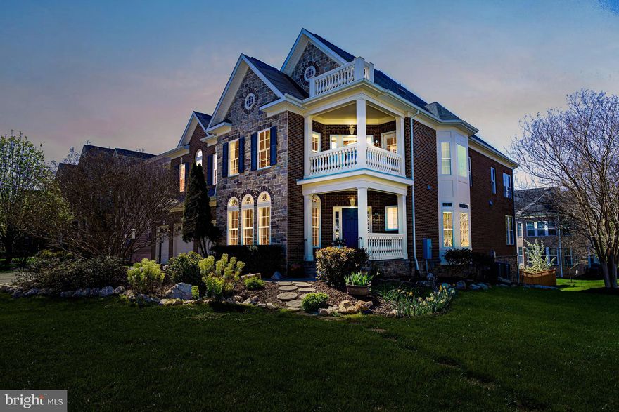 Magnificent all-brick-and-stone home in the sought after Sangster/Lake Braddock school pyramid is a stunner! This more than 7,000 square foot one-of-a-kind home was lovingly designed by the current owners and boasts 7 bedrooms, 6.5 bathrooms, a three-car garage, three fireplaces, multiple decks, a screened-in porch, fresh paint, recessed lighting throughout, and so much more. Natural light pours into the home situated on a 1/3 of an acre off a street that ends in a cul-de-sac. Upon entry, the exotic Cumuru Brazilian teak hardwood floors with a custom inlay design in the foyer will catch your attention. This is just a glimpse into the high-end touches throughout. The open staircase and stunning over-sized chandelier that retracts with the switch of a button for cleaning also impress. The heart of the main level, however, is the custom gourmet eat-in kitchen featuring granite countertops, a wine refrigerator, warming drawer, an 8-foot center island, GE monogram professional 6-burner double-oven range with gas grill and 48-inch evacuator, and a GE monogram 48-inch refrigerator. Also on the main level is a formal living room, a powder room, a spacious family room with access to a balcony/deck overlooking the backyard, a screened-in porch, a main level bedroom suite with its own private bathroom, and a secondary staircase to the upper level. The upper level is fantastic with five generous-sized bedrooms featuring oversized closets, four bathrooms - yes everyone has access to one from their bedroom, and a laundry room. The showstopper of the upper level is the immense primary suite. You will need to see what this grand bedroom suite has to offer, with a gorgeous coffered tray ceiling, a floor-to-ceiling sitting area, a three-sided gas fireplace, a separate study with doors to a private front-facing balcony, a large dressing area, two huge walk-in closets, access to the upper-level balcony/deck, and a bathroom with a separate shower, whirlpool tub, water closet, and two separate vanities. This suite is a private oasis within the home. The lower level is just as impressive with enough space for multi-generational living or simply throwing a fantastic party! There is a huge open recreation room with built-in shelving, a fireplace, a walkout to the flagstone patio, and an oversized bar with a full-sized refrigerator. Off the recreation room is a bedroom, full bathroom, a second laundry room, and two bonus rooms, perfect for a study/homeschooling space and gym. The flat fenced-in backyard offers plenty of privacy and features access to the multi-level patios/decks. Ideal location near major commuter routes, outdoor trails and parks, South Run Rec center, and so much more! 

Other features include:

*Multi zone air conditioning with built-in electronic air cleaner and humidifiers
*Three car garage with automatic door openers and keypad entry
*Upper floor laundry with deep sink, overhead cabinets, and shelving
*Family room with stone fireplace surrounded by built-in entertainment center
*Whole house vacuum
*48 fully wired high-speed internet ports