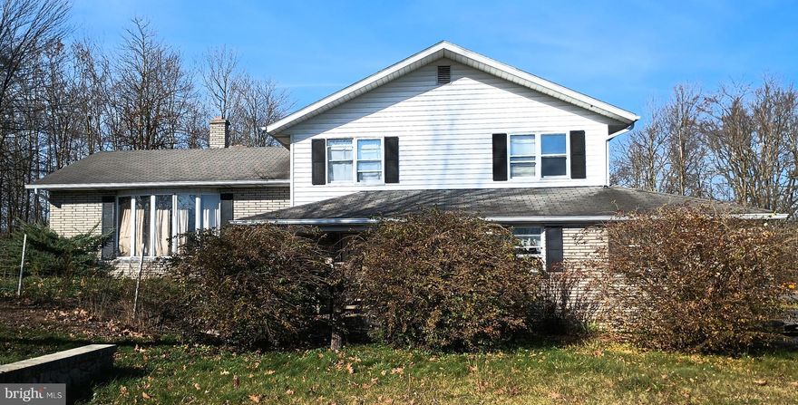 3BR /  2BA home on just under 3 acres with full basement, attached garage and 2 story Machine Shed.  Close to Corridor H, US 50 and Mt. Storm.