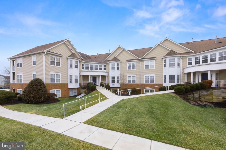 SHOWS LIKE A MODEL HOME.   BRAND NEW SS APPLIANCES TO BE INSTALLED on March 12th. -. This light filled open concept 2BR/2BA Condo home has VIEWS of serene courtyard and Pool!  Walk right in on the main level with no stairs to Spacious 1050 sq. ft. of living space.  Master en Suite with large walk-in closet and Master Bath.  Lots of storage.  Nice kitchen layout with counter seating, eat in kitchen, NEW LG BRAND refrigerator, 6.3 cu ft NEW Easy Clean LG stove NEW, LG Quad wash dishwasher) Home also features PANTRY, LINEN CLOSET, DINING/LIVING room opens to PATIO.  Home has NEWER 2025 Microwave.  High efficiency Gas Furnace 2020.  Sprinkler System. The BAYLANDS with its Secure Building Access entry gives you peace of mind, plus community POOL and CLUBHOUSE. NO WATER OR TRASH BILL.  Easy access to I95 -