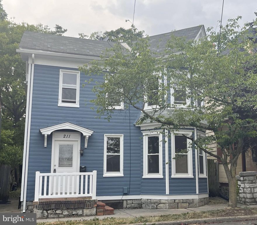 This charming Colonial is conveniently located to all amenities and within walking distance to Downtown Martinsburg.  Features include three bedrooms, two full baths, hardwood flooring, living room with bay window, formal dining area, home office space, separate laundry room with washer and dryer, and an attached exterior storage shed/workshop.  Spend your evenings relaxing on the private rear porch or listening to the sound of the birds singing from the enclosed rear yard.  No pets, no smoking.  All occupants over the age of 18 must complete an application.