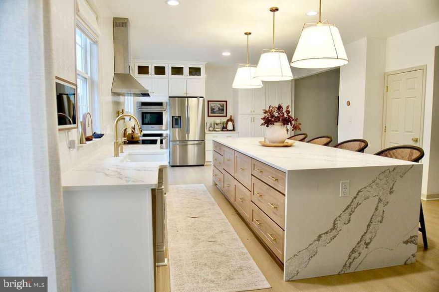 Welcome to this beautifully maintained Colonial in the heart of the highly sought-after Clover Ridge  With three finished levels, a two-car garage, and timeless  this home offers comfort, style, and space for modern living.  the home features an open foyer, gleaming hardwood floors, and a bright, flowing layout,108 Wheeler Ln Chesapeake floor plan by Drees Homes , fully renovated from bottom to top , New Patio Enjoy preparing meals in your eat-in kitchen boasting newer stainless steel appliances, granite countertops, a tiled backsplash, a walk-in pantry closet, 42” cabinetry, ceramic tile flooring and an island/breakfast bar which is perfect for entertaining, homework or a quick meal, The large family room is adjacent to the kitchen and has ceiling fan lighting and a cozy gas fireplace for those cold winter nights. The first floor is complete with a half bath with hardwood flooring, a coat closet, and a large separate laundry room. Upstairs includes 4 bedrooms and 2 full baths. Spacious primary bedroom includes a walk-in closet, a second closet, ceiling fan lighting and vinyl plank flooring. The primary en-suite bath offers a separate shower, double sink vanity, and a soaking tub, where you can relax and enjoy some quiet time. There are three other good-sized bedrooms and a newly renovated hall full bath which includes a double sink white vanity, replacement tub/shower, newer toilet and ceramic tile flooring. Need more space? Head down to the lower level spacious recreation room to entertain or to watch your favorite movies, sporting events or television shows. This area is also ideal for playing pool, foosball or as a movie room. Plus there is a 3rd full bath and another finished room that can be used as a den, home office, exercise room or guest room. The basement also includes a utility room and an unfinished storage area to store all your holiday decorations and extra personal belongings. With over 3,300 s.f. of finished living area there’s lot of space to enjoy. The Clover Ridge neighborhood offers an outdoor swimming pool and within the community, you’ll find Clover Ridge Park off of Washburn Drive that has basketball courts, a pavilion and a large multi-purpose field. The home’s location is in close proximity to Frederick Community College, Fort Detrick, St John School, Route 15 and minutes away from shopping and downtown Frederick.