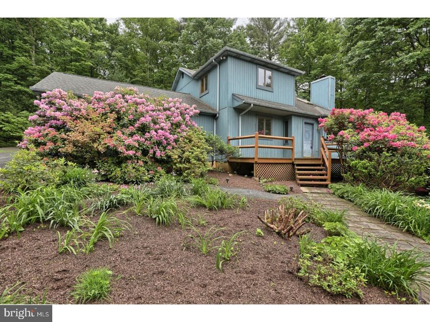 Hidden from the road and nestled in a wooded lot consisting of 1.20 acres is where you'll find this well cared for home. Nature abounds from every window. Upon entering the front door, you are immediately greeted with an eye-catching floor to ceiling brick woodburning fireplace in the 2-story vaulted ceiling living room with skylights. This flows nicely into the dining room with French doors leading to a screened in porch, perfect for relaxing with a drink while enjoying the abundant wildlife and lovely flowering shrubs. The kitchen is spacious and offers sliders out to the back deck. There is a 1st floor bedroom and full bath, making one floor living a breeze.  Upstairs is the master suite with a private full bath, walk in closet and washer and dryer conveniently located right where you need it. This is also where you'll find the loft which can be used as a loft bedroom or a hangout room ? you choose. This has sliders out to a peaceful balcony.  Much of the house has been freshly painted in todays neutral color scheme. This house is squeaky clean and ready for new owners! There is a 2-car garage as well as plenty of parking for your toys or visiting family and friends. Whether looking for a weekend getaway or year-round living, you can't beat what Lake Wynonah has to offer! 2 freshwater lakes offering docks, boating, fishing, waterskiing and swimming as well as walking trails, a Lodge with restaurant and bar and community clubs and groups for people of all ages plus so much more, and of course 24/7 gated security. Did I mention, the NEW energy efficient heating and central air system are less than one year old! A quick commute from Harrisburg, Reading, Allentown, New Jersey and more.  Taxes are for al 3 lots.  28-16-2480 & 28-16-2481 & 28-16-2478