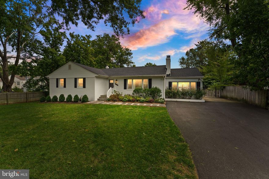 This unique, ranch-style residence sits on a serene half-acre lot, offering both privacy and a sense of community. Meticulously renovated almost 3,500 square feet, this home combines modern amenities with charming details and includes important updates like new siding and fresh painted brick front, roof (2022), attic insulation (2022), HVAC/WH (2016). See the full list in the documents section.

As you enter, you’ll be greeted by an inviting open floor plan. The fully modernized kitchen boasts freshly painted cabinetry, new hardware, and a cozy breakfast space featuring a charming banquet. The adjacent sunroom, currently utilized as a dining area, enhances the home’s appeal with a custom pantry for added convenience.

A cozy wood burning fireplace in the spacious family room, is ideal for gatherings and everyday living. This home offers convenient main-level living with a primary suite, two additional bedrooms, and a full bathroom all situated on this floor.

Venture downstairs to the fully finished walk-up basement, where you'll find two legal bedrooms, a full bathroom, and a versatile rec space with fireplace. The new, custom, dry bar and office space make this area perfect for work, play, or hosting guests. Ample storage is available to meet all your organizational needs throughout the home.

Step outside to the backyard, an entertainer's dream come true. Enjoy Sunday Football and summer gatherings on the expansive Trex deck and patio, complete with a fire pit for those cooler evenings. The large outdoor projector screen conveys with the property, making it easy to host movie nights under the stars. The home also has an irrigation system for the oversized lot.

Additional features include a one-car garage, long driveway for ample parking and a fenced backyard. Don’t miss this opportunity to own a beautifully updated home in a prime Falls Church location. Open House Saturday, September 14th from 11am-1pm with a private barista! Offer deadline Monday September 16 at 10am, highest and best please no escalation addendums.