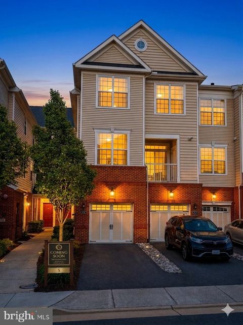 Photo of 23300 Milltown Knoll Square #113, ASHBURN, VA 20148 (MLS # VALO2124834)