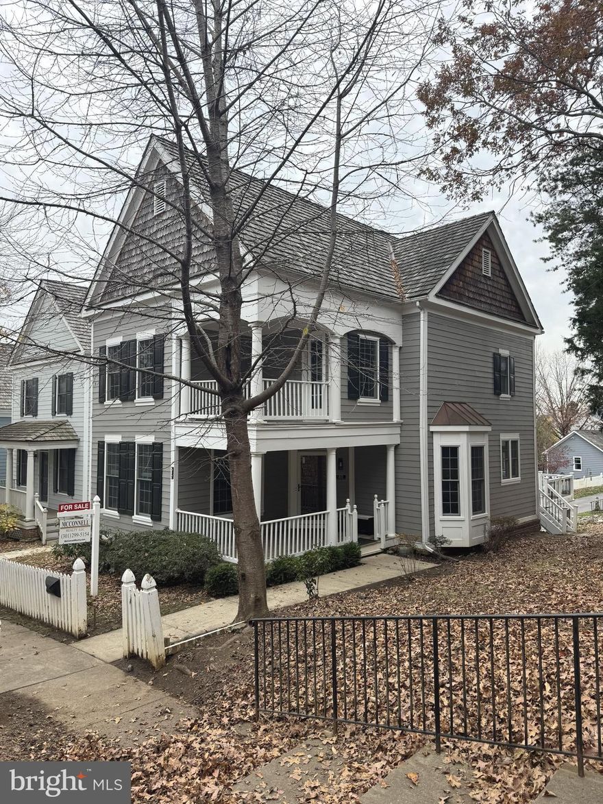 Welcome to the highly sought-after Kentlands Hill District! This bright and spacious home features 3 bedrooms and 3.5 bathrooms across three finished levels with an open floor plan filled with natural light. Enjoy beautiful wood floors, a cozy fireplace, generously sized rooms, a gas stove, and the convenience of a bedroom-level washer and dryer. Bathrooms have been tastefully updated. The lower level includes a full bath and walkout rear entrance—ideal for a guest suite, game room, or recreation space. Outdoor living is easy with a welcoming front porch, private rear deck, and third-level balcony. Parking includes two spaces—one uncovered spot plus a detached 1-car garage with a newly installed 240-volt outlet ready for your EV charger. Fantastic location within walking distance to all Kentlands amenities, including parks, playgrounds, the community clubhouse, gym, outdoor pool, pickleball courts, and an array of shops and restaurants!