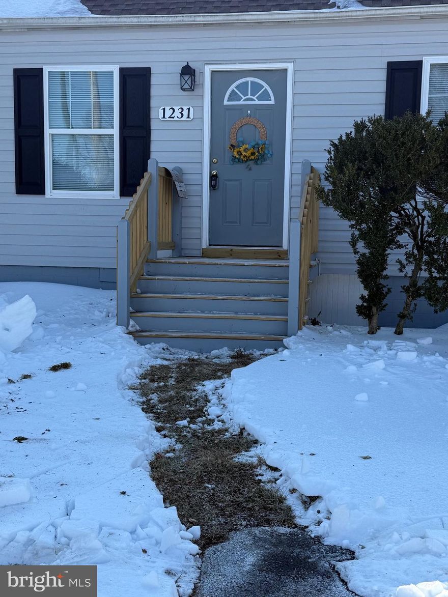 Driveway is cleared, walkway is shoveled, owner is offering a 2 year buy down interest rate for the purchaser with an acceptable offer.  With a beautiful main level  primary with bathroom including dual vanity & bright spacious tile shower, this home offers the buyer great one level living.   Owner has opened the living area to flow from living room, kitchen to dining area.  Upstairs are 2 bedrooms with a full bath in the middle. Parking in front or in rear.  The rear yard also has space for enjoyment with a stone patio. Basement is an exterior entrance for plenty of storage.  Driveway is shared.  Come to Culpeper which is one of 28 Virginia Main Street Communities. Conveniently located across from Yowell elementary school.