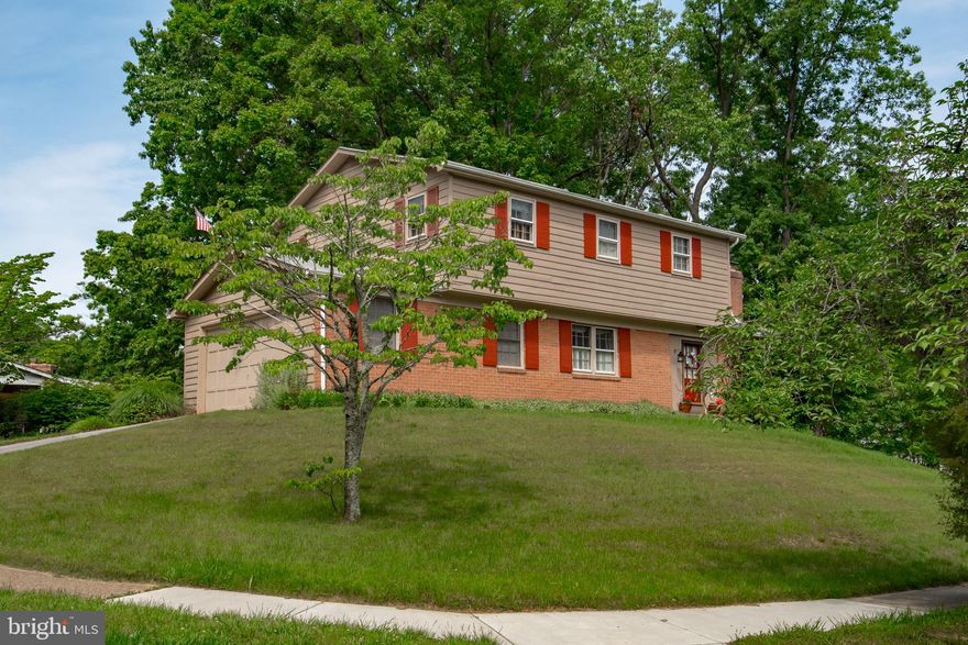 Rare opportunity to live in a water privileged neighborhood in Severna Park at a fantastic price!  Benfield Manor is perfectly located between multiple award-winning Severna Park schools and is just a mile from the community's private pier and boat launch on the Severn River.   Four bedrooms with two full baths on the upper level.  Protected hardwood flooring on the bedroom level and in the living room and dining room.  Wood burning fireplace.  Large two-car garage.  Large basement with a side-door walkout that could add significant square footage when finished. The home is priced with the buyer's need for updates in mind.  Offered As-Is, and sellers request a post settlement occupancy time period so that they can find their next home. Community playground and multiple community events make this a great place to thrive and grow for years to come.