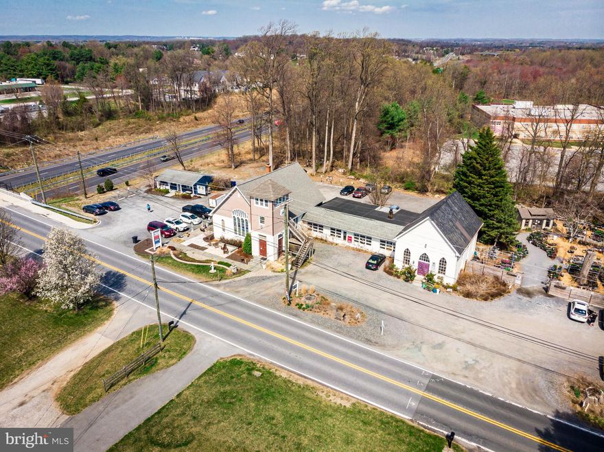 Opportunity is knocking right now.  Multi-use B-1 zoned building offering multiple retail spaces, offices and exterior storage options. This sprawling building with approximately 10,000 square feet is currently 100% occupied, 75% tenants, 25% current owner's use. Leases are mostly month-to-month offering the next owner lots of options. The main buildings started out as churches that were then joined by classrooms. Currently the main building has two additional accessory buildings with private entrances. In total the property has 2 full baths and 2 half baths.  There are 3 air-conditioning units and 3 oil furnaces plus one heat pump. Get your foothold in the western area of Howard County  just off of Route 32 where limited BR zoning is available. Shown by appointment only with POF required.