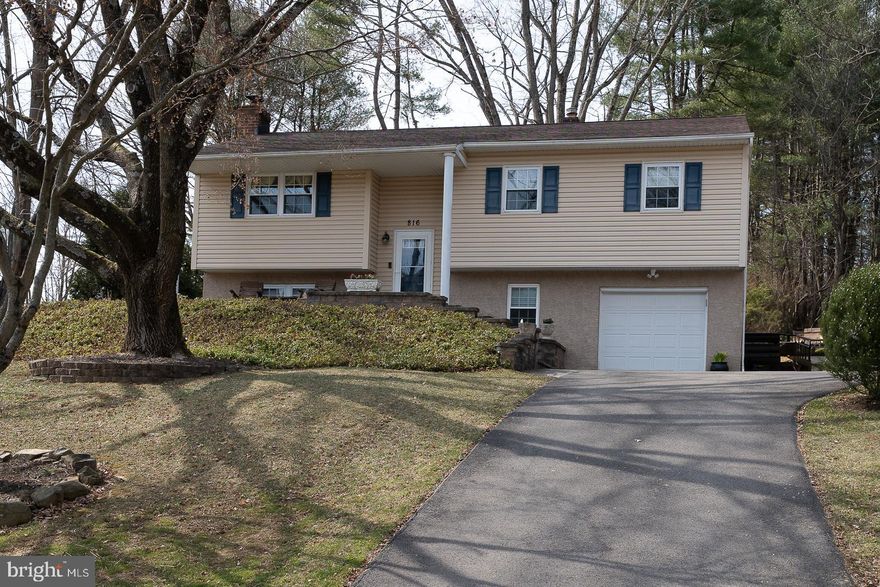 Move-In Ready 4BR Bi-Level Home with Modern Upgrades.  The home is available to see Thursday, 3/13.  Pics will be available on Thursday 3/13 as well.

Hurry in to see this beautifully maintained and move-in-ready 4-bedroom, 2.5-bathroom bi-level home, offering a perfect blend of modern updates and cozy charm.
Step into the newly renovated kitchen, featuring granite countertops, stainless steel appliances, tile flooring, and large cabinetry with elegant crown molding.   Granite counter tops and a bar-top granite counter with stools creates the perfect space for casual dining or entertaining. Large windows flood the kitchen with natural light while offering a peaceful view of the serene backyard.
Enjoy year-round comfort with a newer heat pump and oil furnace backup, along with newer central air conditioning.   The spacious main bedroom boasts laminate flooring, large windows with private backyard views, and a newly remodeled en-suite bath featuring a glass-enclosed walk-in shower. The updated hall bath includes a tub/shower combo and modern vanity. Two additional bedrooms, one with hypoallergenic carpet, complete the upper floor.
The lower level offers a cozy family room with a fireplace and wood stove, perfect for relaxing, watching TV, or working on puzzles. A fourth bedroom/office space provides flexibility for your needs.
Outdoor living is just as inviting, with a large composite deck, ideal for entertaining or enjoying the peaceful surroundings.  The deck features an upgraded spindle railing, with lights on each step and lights on each cap on the deck.  There is a large storage area with lighting under the deck with door access from two sides.
Additional features include an epoxy-covered garage floor and a driveway with a convenient turn-around area.  This home has been meticulously cared for and is truly move-in ready—don’t miss the opportunity to make it yours! Schedule a showing today.