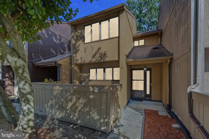 Don't miss out on this 4 bedroom townhouse.  Freshly painted.  Kitchen with stainless steel and backsplash. Fully finished basement with bedroom and bath.  Walkout lower level.  Three Outdoor spaces for relaxing-cozy courtyard patio.  Stainless Steel appliances.  Contemporary finishes throughout.  Tons of natural light makes this home a must see.  Dining Room and Living Rooms have retractab;e ceiling fans with dimmable lights and remotes.  The living room has a wood burning fireplace with brick surround and wood mantle.  Walk out to the brand new deck with a backyard that backs to trees.  The upper level has 3 bedrooms, all with retractable ceiling fans and two completely renovated bathrooms.  Large walk in closet in the Primary suite.  Linen closet on upper level.  The lower level has a legal finished bedroom and full upgraded bath.  The bedroom has a retractable ceiling fan as well.  The laundry room has a utility sink.  Family Room on lower level also has a retractable ceiling fan.  Walk out lower level to fenced backyard with patio and storage shed.  The Rippon Community has a community pool, walking/jogging paths, playgrounds, basketball and tennis courts.