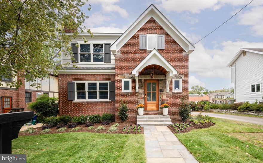 This immaculate home, extensively renovated by prestigious local builder Morris Construction, is a true gem located in the heart of Del Ray. Boasting 6 bedrooms and 5.5 bathrooms, this home blends classic architectural charm with modern amenities, offering a spacious and luxurious environment for both family living and entertainment. Enter into the foyer and to the left a versatile space awaits, perfect for a large office or a main level bedroom, complete with its own en suite bathroom. A separate dining room provides an inviting setting for formal gatherings and special occasions. Across from the dining room is a gorgeous butler's pantry. Complete with a sink, abundant cabinetry, dishwasher and wine storage, this space is ideal for entertaining or everyday living. The gourmet kitchen is a chef’s dream featuring an oversized island with quartz countertops, large farmhouse sink, 48 inch range with custom hood, 40 inch refrigerator and more. A convenient pantry and mudroom allow for an abundance of storage, while a built-in "command center" desk is perfect as a charging station and mail drop. Entertaining is a breeze with an additional dining area just off the kitchen - the banquette features built-in seating with even more storage. The family room has a cozy fireplace and easy access to the large screened porch, providing a seamless connection to the outdoors. Head upstairs where you will find four bedrooms, three full bathrooms and a conveniently located laundry room. The primary bedroom is a true retreat, complete with an en suite bathroom, walk-in closet and second closet space. The spa-like bathroom has a soaking tub, large shower and double vanities. The secondary bedrooms are very large, and the hall bath offers a double vanity and a separate toilet and shower/tub area to maximize privacy. Laundry is a breeze in the beautiful laundry room - built in cabinetry, a hanging rod and a folding area make this chore seem like fun. Downstairs, the fully finished basement adds a wealth of possibilities for entertainment and relaxation. A large recreation room can easily accommodate a pool table and large sectional, and a sixth bedroom with its own en suite bathroom makes a great guest space. Located just one block from the “Avenue," this property offers immediate access to a variety of restaurants, coffee shops, fitness gyms, shopping and more. For even more shopping, entertainment and cultural opportunities, you're just moments away from Potomac Yard and the historic charm of Old Town. Commuting is a breeze with a bus stop just a block away, and the convenience of the Braddock Road Metro station, located just one mile from the property. Easy access to I-395.  Welcome Home!