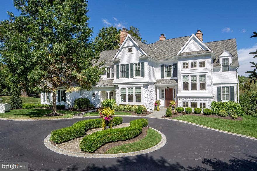 Like NEW, meticulously maintained & nestled on 1.5 acres, this impeccably crafted custom Main Line residence is a one-of-a-kind setting at the end of a cul-de-sac. Enjoy awing views from every room & of the 170-acre Waterloo Mills Preserve from the rear of your own private sanctuary! A majestic home awaits down a crabapple tree lined winding drive leading to a circular courtyard, framed by expansive stone landscape walls. A setting so peaceful you may forget you're just 2 miles to the heart of coveted Wayne! Designed by McIntyre Capron Architects, this is a stellar example of a classic yet modern custom Colonial that exudes an ambiance of elegance. Enter to 10' ceilings, oversized windows, 4 fireplaces, cherry wood floors and a fireside living room that presents stunning views of the preserve. Recently renovated & meticulous interior affords an effortless flow for entertaining yet provides comfortable living for the entire family. Wainscoted dining room w/ fireplace adjoins the new butler's pantry. Recently renovated chef's kitchen features Wood Mode cabinets and top-grade appliances, centered by a huge marble-top island, is adjacent to a potting room-office, a stunning vaulted breakfast room and the coffered ceiling family room w/ fireplace, custom built-ins with TV, window wall & French doors that open to the flagstone terrace w/ new expansive awning, fire pit, outdoor kitchen and heated swimming pool. Sip cocktails in the cherry-paneled library w/ fireplace & custom built-in cherry cabinetry. Security system, SONOS, two powder rooms, mudroom, & 3-car garage further meet your needs. Luxurious, vaulted ceiling, master retreat has separate his & her marble baths & walk-in closets, built-in entertainment center, sitting room & private balcony. Also on 2nd level are 3 en-suite bedrooms, laundry and a connected apartment w/ outside entrance, offering kitchenette, living room, en-suite bedroom & bonus loft. Day-lit walkout LL has wine cellar, wet bar, theater, billiards, gym, sauna, full bath & substantial storage!