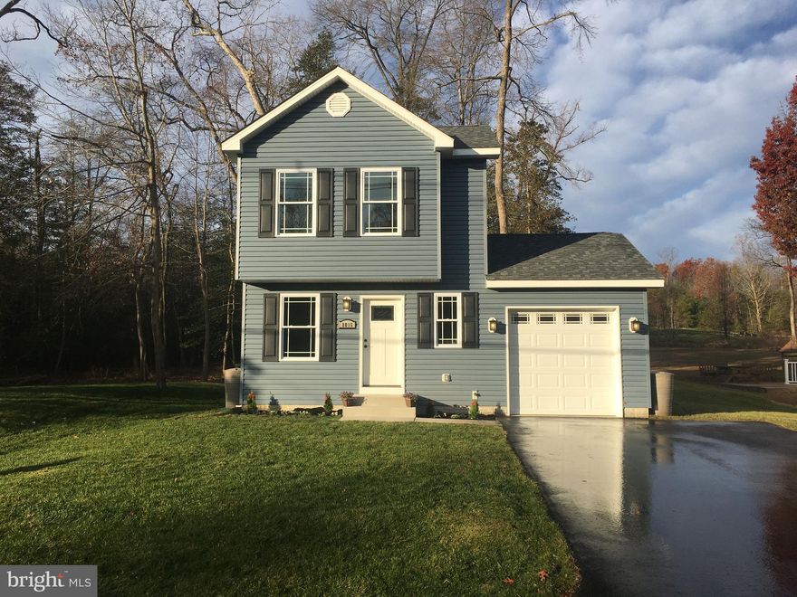 Perfect, new construction, little 2 bedroom house with the BEST Location, location, location this almost half acre property backs to Compass Pointe Golf Course and is less than 1 mile to Ft.  Smallwood Elementary School, Poplar Ridge Park, Bodkin Yacht Club, Pleasure Cove Marina and waterfront dining/bar! 3 miles to Ft Smallwood Park and under 4 miles to shopping and highway. Quiet and rural but close to everything! The awesome kitchen features upgraded white shaker cabinets with soft close drawers, granite counter tops, under counter lighting and a peninsula that can seat up to 5 people! Tons of recessed lighting make this home shine! The inside access to the garage and the crawl space means this home has lots of room for convenient storage. Put this on your  must see  list. Builder says bring all offers, he is moving on to his next project and ready to make a deal! Closing help possible to make this house your home!