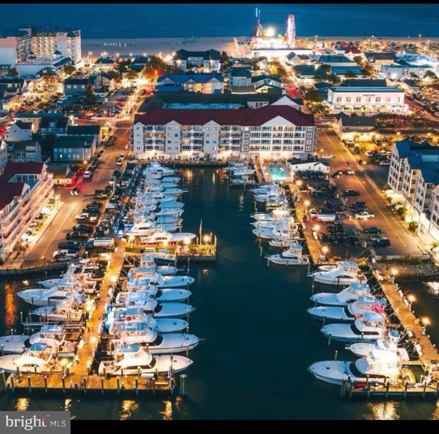 Welcome to coastal luxury at its finest—this stunning 3rd-floor condo in the highly coveted White Marlin Condominium & Marina is nestled at the southern tip of Ocean City, offering an unbeatable combination of style, comfort, and waterfront living. Fully renovated and newly furnished in 2023, this immaculate unit has never been used as a rental, reflecting true pride of ownership and pristine condition. Step onto your spacious waterfront balcony and take in breathtaking views of the Bay, marina, and unforgettable sunsets—a perfect backdrop for morning coffee or evening cocktails. The property conveys fully furnished, so you can move right in and start enjoying the good life. Included is deep water boat slip #5, which accommodates vessels up to 50 feet and can either be enjoyed by the new owner or rented for additional income; the marina was dredged in 2024 for smooth, stress-free navigation and offers unrestricted inlet access to the Atlantic. The association just completed over $2 million in exterior renovations, including new siding, walkways, railings, windows and doors in every unit, and updated marina decking—all special assessments have been paid in full by the current owner. You'll also enjoy two assigned parking spaces (one covered), and a prime location just a short walk to the beach, boardwalk, inlet, restaurants, pubs, and Ocean City’s festivals. This is a rare opportunity to own a turnkey, beautifully upgraded waterfront retreat with every amenity you could dream of - all in one of Ocean City’s most exclusive locations.