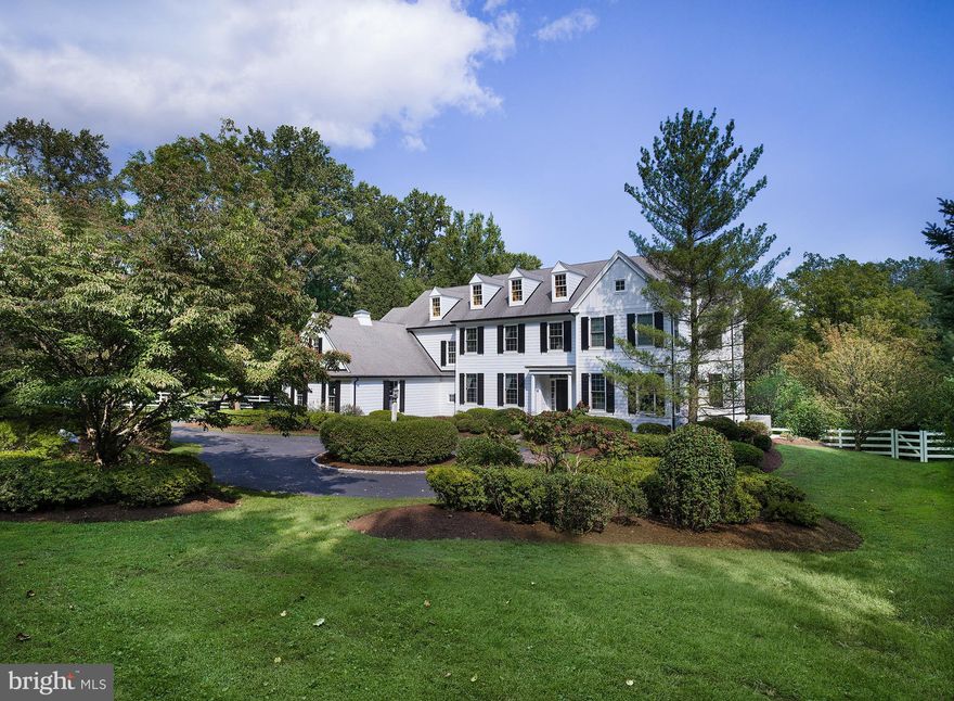 We're back on the market and better than ever. The home has been completely stripped of the stucco and a windows out installation of very attractive white Hardi Plank, clapboard and board and batten fiber cement siding.  The windows gutters and downspouts have been replaced with black, accenting the white siding. The curb appeal of this exceptional colonial begins with a completely fenced gated property offering security and privacy leading into a beautiful circular driveway. The grand center hall welcomes you into a completely renovated open floor plan offering every conceivable amenity in a tranquil, beautifully landscaped setting.  The gourmet kitchen with granite counters, top of the line cabinetry and commercial grade appliances is ready for entertaining with full views to the eating area, living room and expansive deck.   The first floor hosts a dining room and office with attached gym. The second floor master suite with sitting room and beautifully adorned master bath is the perfect retreat for rest and pampering at the days end.  The additional three bedrooms and two  bathrooms complete the second floor. The finished lower level boasts an additional bedroom and full bath along with a game room and play area with access to an exceptionally large stone patio with a newly expanded sitting area complete with a stone firepit. A small cottage style shed sits adjacent to the 3 car garage. There are 9 ft ceilings throughout, custom trim work, solid wood doors and newly updated black hardware. A truly spectacular family home awaits all the fun, love and laughter for years to come!