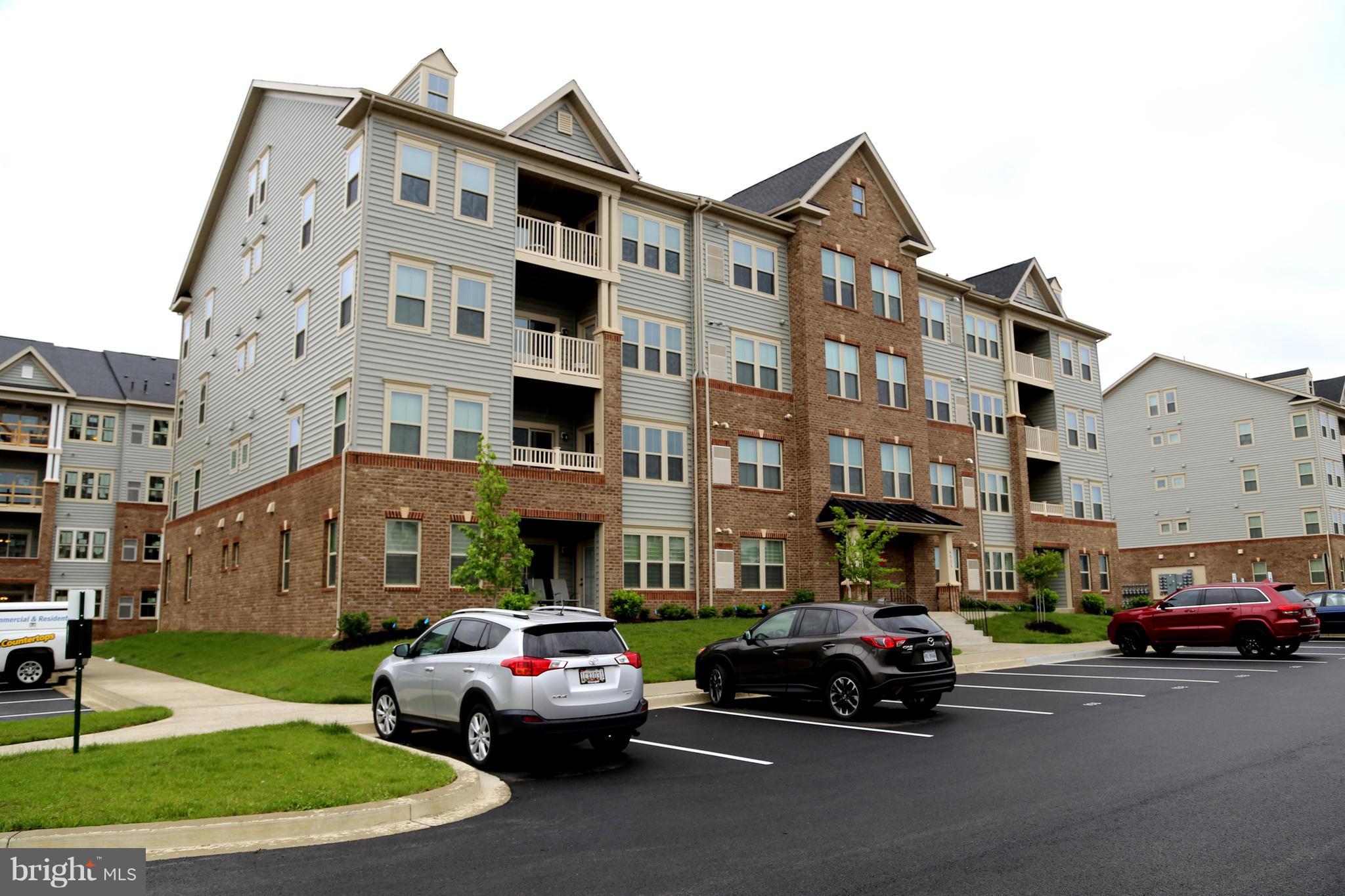 Unit # 203,Beautiful 2BR 2Bath condo in wonderful community. Secure entry,Elevator and assigned parking. Open floor plan. Granite counters and walk in shower in master suite with built in bench. Custom Wooden blinds and curtains. Extremely clean and move in ready. Close to all of the restaurants and shopping.