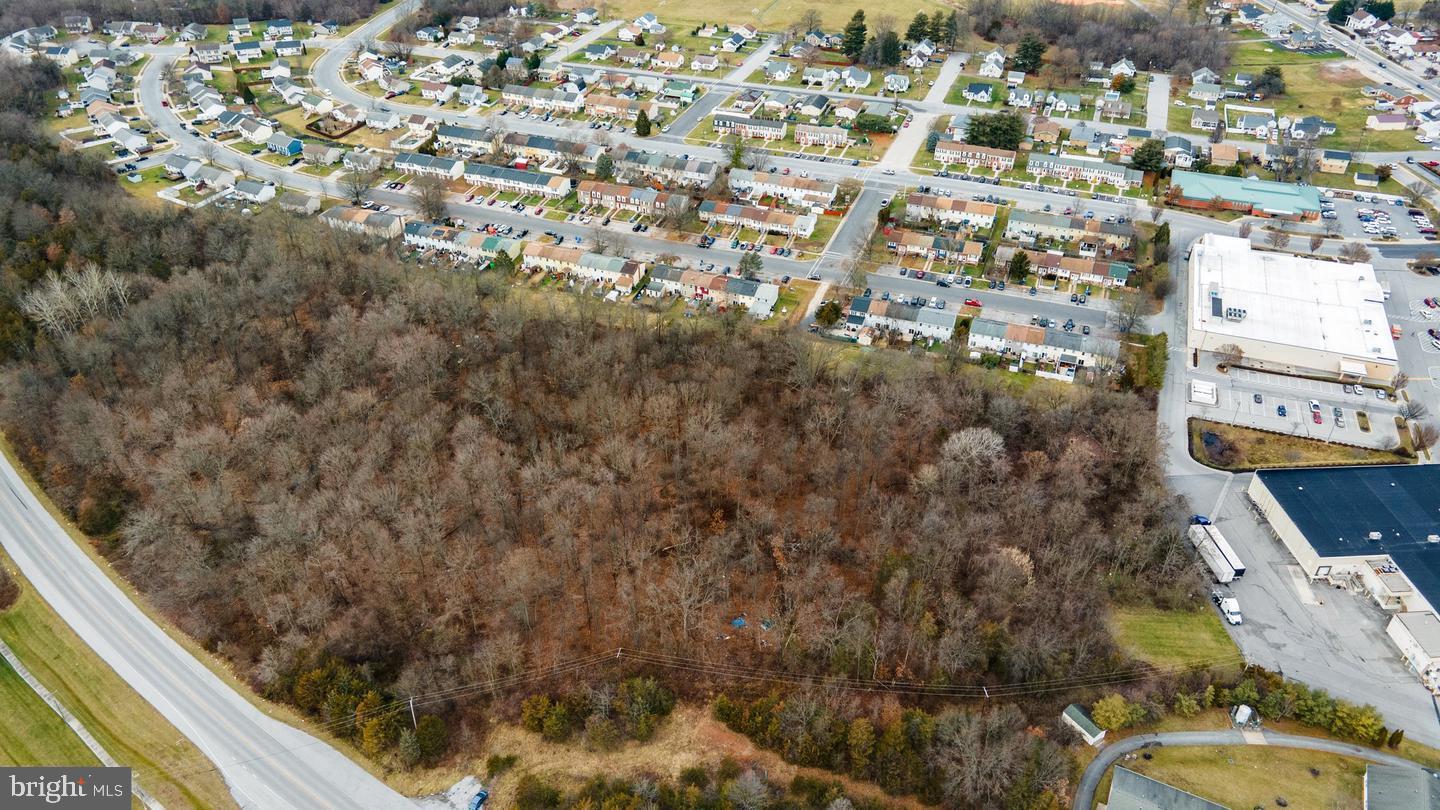 Explore the potential of this 3.74-acre commercial lot in Taneytown, offering a prime location for your builder or developer clients. Accessible via Carnival Drive, the site holds promise with available water and sewer connections per the Seller. The seller believes there is a possibility of access to Antrim Rd and is open to holding financing for qualified Buyers. Verify land use possibilities with Carroll County/City of Taneytown. Buyer to conduct all due diligence. Property was once zoned for Residential, check with City/County if seeking to variance for Residential Zoning