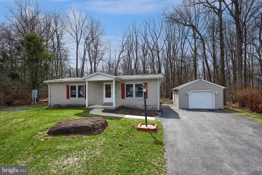 Welcome to 17 Aspen Drive! This home is located in the desirable Gretna Springs 55+ Community on a quiet cul-de-sac. With 2 bedrooms, 1 & 1/2 bathrooms, and over 1,100 sq ft, this home features a nice-sized living room with a gas stove that flows into the kitchen and dining area, which continues into a sunroom overlooking the private backyard. The primary bedroom has an attached half bathroom, and there is an additional bedroom with a walk-in closet and an additional full bathroom. There is an oversized 1-car garage, allowing for additional storage. This home is centrally located off Route 72, just minutes from the PA Turnpike and Route 322. Lot rent includes water, sewer, trash, and access to the community center. Don't miss this opportunity, schedule your showing today!