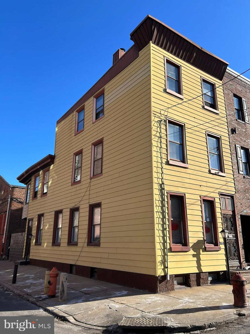 One-of-a-kind opportunity in Red-Hot Fishtown! This unique, genuine, 5-bedroom end-of-row home is a blank canvas bursting with natural light from its many side windows and offers endless possibilities for customization. Just blocks from Fishtown’s restaurants, shopping, and nightlife, the home features a spacious first floor with a foyer that can be transformed into an open-concept living area, flowing into a kitchen space that leads to a private back patio. The second floor includes three generously sized bedrooms and a large bathroom, while the third floor, with two additional bedrooms, could be converted into a stunning primary suite with a roof deck. The home is primed for renovation with high ceilings, forced hot air heat, and existing central air ductwork. Boasting a Walk Score of 95, this is truly a Walker’s Paradise—just minutes from Center City, public transportation, I-95, and bridges to New Jersey. This as-is sale offers an unbeatable location and immediate possession—don’t miss this incredible chance to create your dream home!