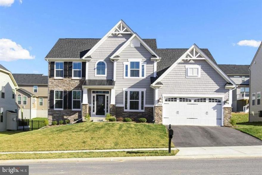 BESIDES STYLE & CHARM THIS COLONIAL HAS 5 BEDROOMS AND 3.5 BATHS W/A 2 CAR GARAGE! BUILT IN 2015 THIS HOME FEATURES DESIGNER OPTION AND OVER 3300 SQ FT OF LIVING SPACE -- 2 MASTER SUITES WITH FULL BATHROOMS -- LARGE OPEN KITCHEN WITH GRANITE COUNTERS AND STAINLESS STEEL APPLIANCES -- FAMILY ROOM WITH GAS FIREPLACE -- ROUGH IN FOR A BATHROOM IN THE UNFINISHED BASEMENT TO ADD ANOTHER 1800= SQ FT..