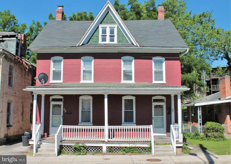 All brick duplex with available off-street parking, fenced rear yard and full covered front porch.  Updates include vinyl replacement windows, natural gas furnaces, natural gas hot water heaters and updated kitchen cabinets on both sides.  The property includes full unfinished basements and attics for additional storage on both sides.  Basements have been improved with concert floors.   The home is in need of renovations and is being sold as-is.
Located within walking distance to Wheaton Park, area schools and the historic downtown Hagerstown Arts & Entertainment District.