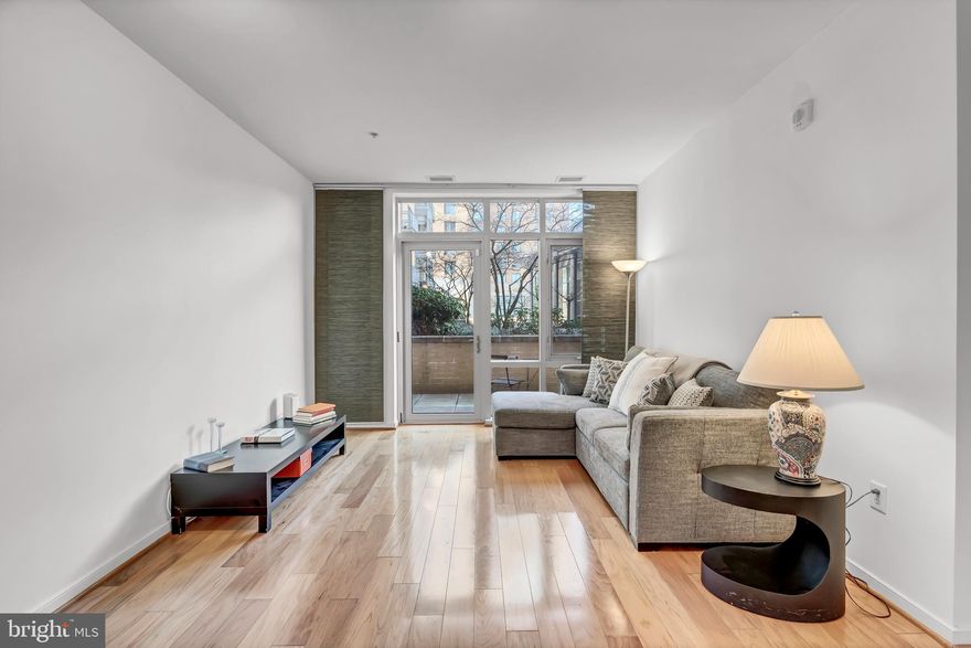 This upscale 1 bedroom, 1 full bath condo has approximately 700 square feet of space features an open floor with bright sun exposure facing into landscaped center courtyard. It has a stunning kitchen with granite countertops, stainless steel appliances, large bathroom with updated vanity, an in-unit washer and dryer.  It also features its own private outdoor large outdoor patio for relaxing, entertaining or grilling. Priced below recent comparable sales in the building with a low condo fee and parking included.
This attractively located condo is in the heart of Hyattsville's revitalized Prince George's Plaza area in the One Independence Plaza with many shops, restaurants and movie theatre just a stone's throw away. This condo's many amenities include a state-of-the-art fitness center and spacious meeting/club room for entertaining. Conveniently located steps to the metro station and public transportation. Quick access to major highways and easy commute to downtown DC, and University of Maryland, College Park.