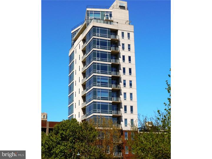True luxury living at The Beaumont. FULL FLOOR residence with 2-CAR garage PARKING and a 900 sq ft outdoor urban oasis!! Originally purchased as raw space and professionally designed with high end materials & finishes throughout. Elevator opens right into the unit. Grand living room with Santos Mahogany wood floors, large windows and 2 terraces. Beautiful built-in entertainment console with fireplace and desk on opposite side. Top of the line kitchen with professional grade appliances, soapstone counter tops and large island. Gallery hallway with architectural barreled ceiling leads to generous size master bedroom and walk-in closet. Incredible master bath with Calcutta-gold marble tile, deep soaking tub, 5x8 shower room with multiple head shower system and steam room feature. Surround sound throughout entire home, dual zoned HVAC, and central vac. Door man and 24 hour virtual security on site. Bridge and waterfront views, across from a beautiful and tranquil memorial park.